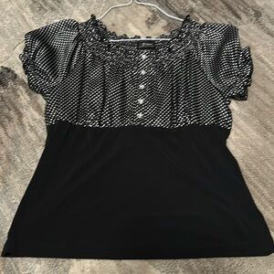 Black with white polka dots, crystal buttons. Size xl but more like a medium